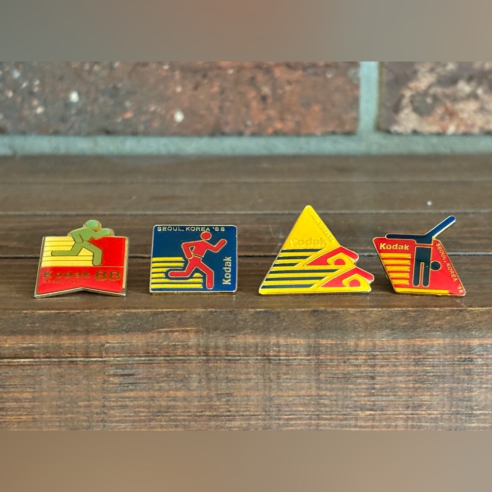 Vintage 1988 Kodak Seoul Korea Olympic enamel pins.